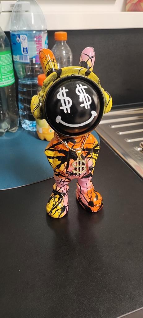 Astronaut "Dollar"-versie (met hanger), Antiek en Kunst, Kunst | Designobjecten, Ophalen of Verzenden