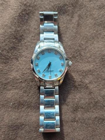 Esprit horloge met lichtblauwe wijzerplaat
30 mm. beschikbaar voor biedingen