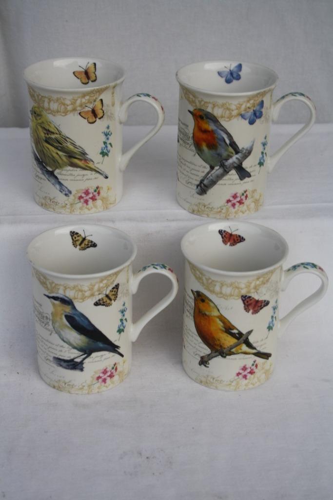 4 koffietassen / mokken met afbeeldingen van vogels in 1 lot, Huis en Inrichting, Keuken | Servies, Zo goed als nieuw, Kop(pen) en/of Schotel(s)