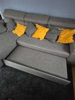 Grijze zetel uittrekbaar tot bed, Enlèvement