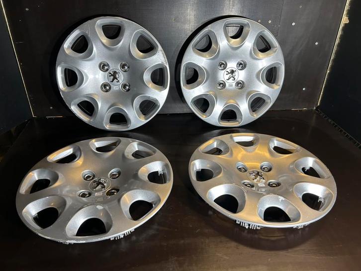 4 originele Peugeot 307.308.207.208 partner 15" wieldoppen, Auto diversen, Wieldoppen, Gebruikt, Ophalen of Verzenden