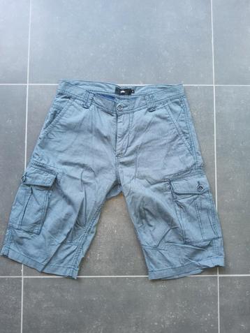 Geruite herenshort met zijzakken Celio 40 beschikbaar voor biedingen