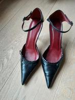 Zwarte hoge hakken, Ophalen