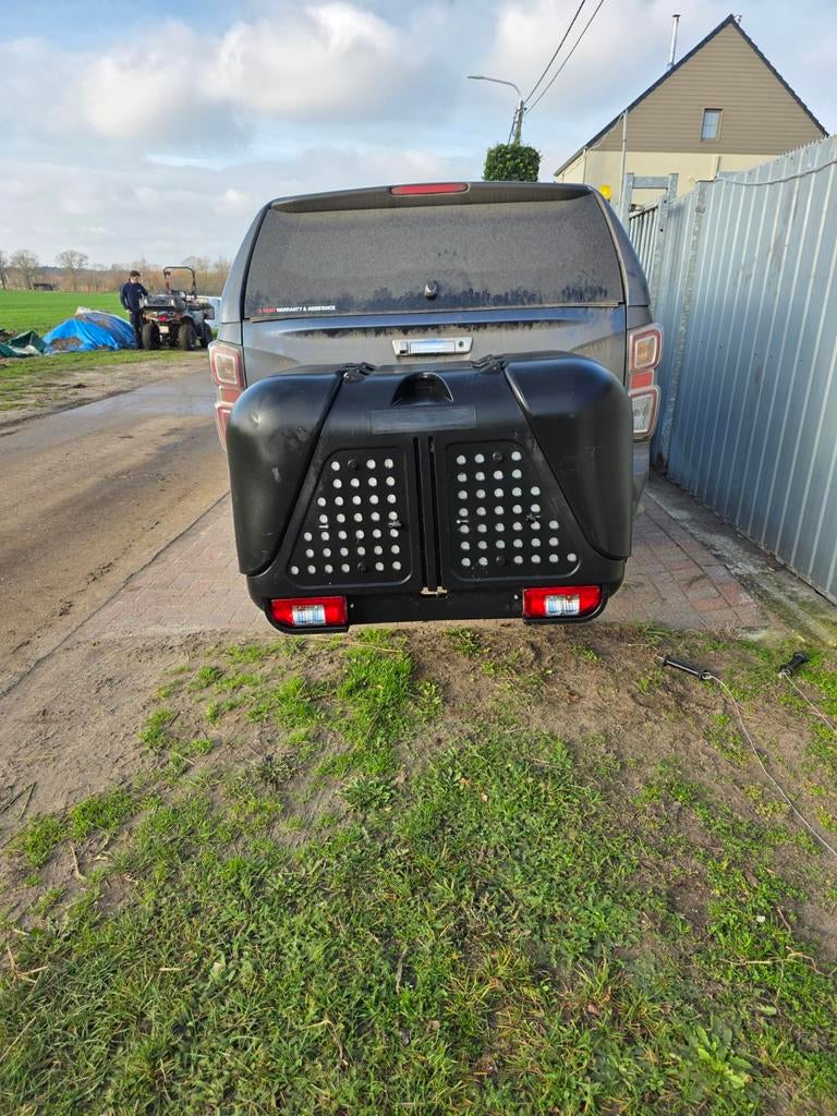 Achterbox honden, Ophalen