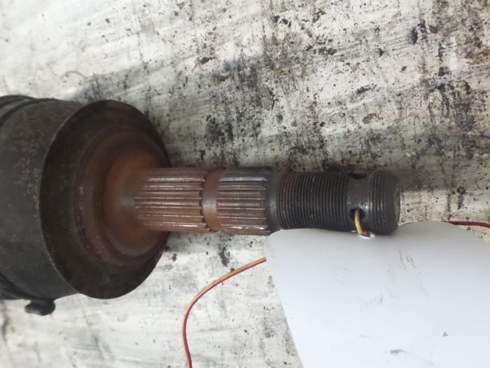 Aandrijfas links-voor van een Opel Corsa, Auto-onderdelen, Remmen en Aandrijving, Gebruikt, 3 maanden garantie, Ophalen of Verzenden