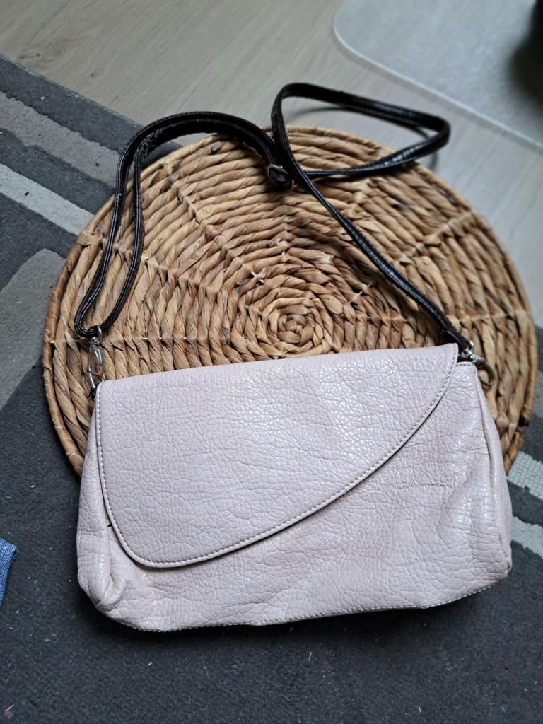 Handtas, Ophalen, Handtas