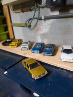 7 opels modelautos, Ophalen