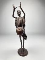 Statue africaine en étain, Enlèvement ou Envoi