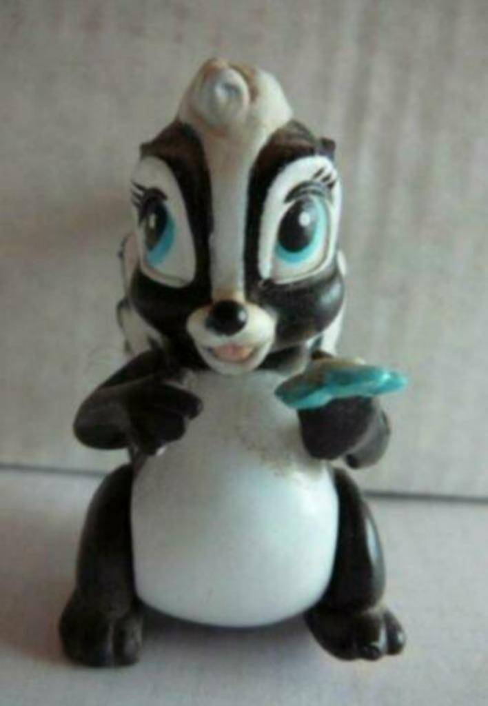 Disney Bloempje stinkdier hoogte 7 cm pootjes en kop bewegen, Verzamelen, Disney, Gebruikt, Beeldje of Figuurtje, Overige figuren