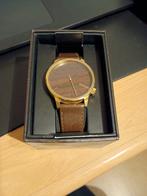 Herenhorloge komono, Ophalen