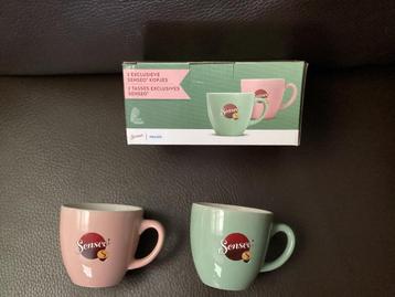 Senseo set van 2 exclusieve tassen (1 rosé en 1 groen ) beschikbaar voor biedingen