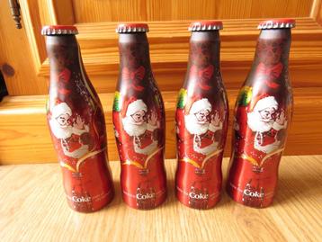 4 bouteille Coca Cola motif taste the coke side of Christmas beschikbaar voor biedingen