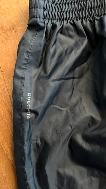 Regenbroek donkerblauw 8/9j beschikbaar voor biedingen