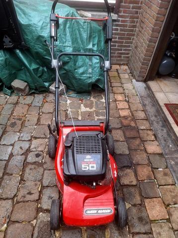 Briggs en stratton grasmaaier met NIEUWE CARBURATEUR  beschikbaar voor biedingen