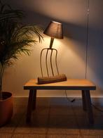 Lamp gemaakt van een riek, Ophalen