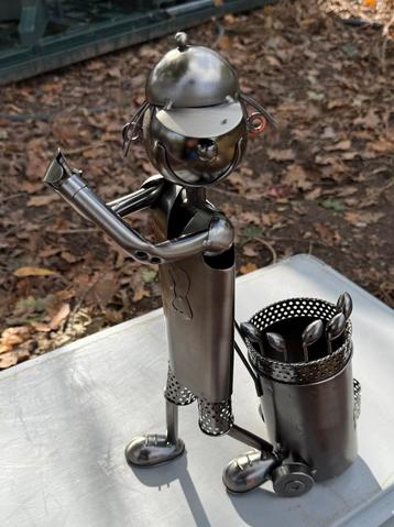 Metalen golfer. beschikbaar voor biedingen