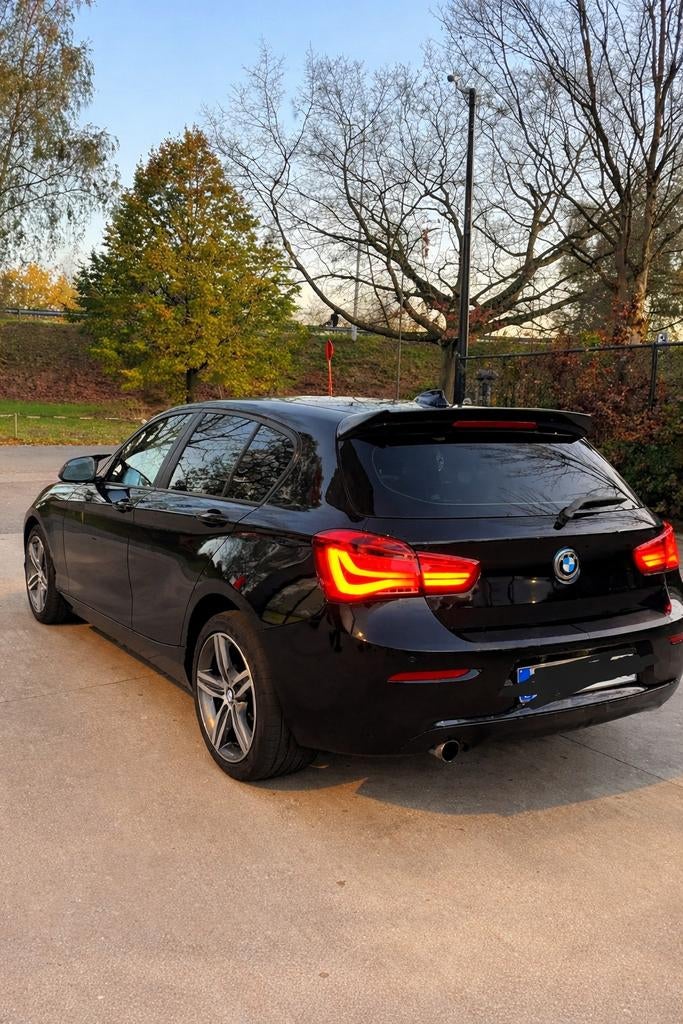 BMW 118i - 2017 - 94.000km - Benzine - Gekeurd - Veel Opties, 100 kW, Zwart, Leder, 5 deurs
