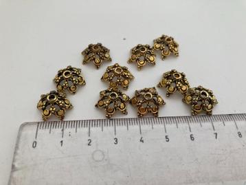 Goudkleurige kralenkapjes ster - 10 stuks beschikbaar voor biedingen