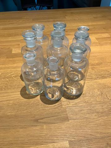 Oude Apothekersflessen wit, Enlèvement