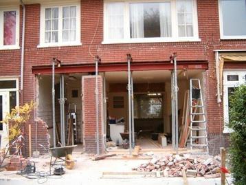 Binnen en buiten muur afbreken en poutrel zeten.0466498753