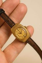 Montre Oris pour femme en métal doré des années 1970, Enlèvement ou Envoi