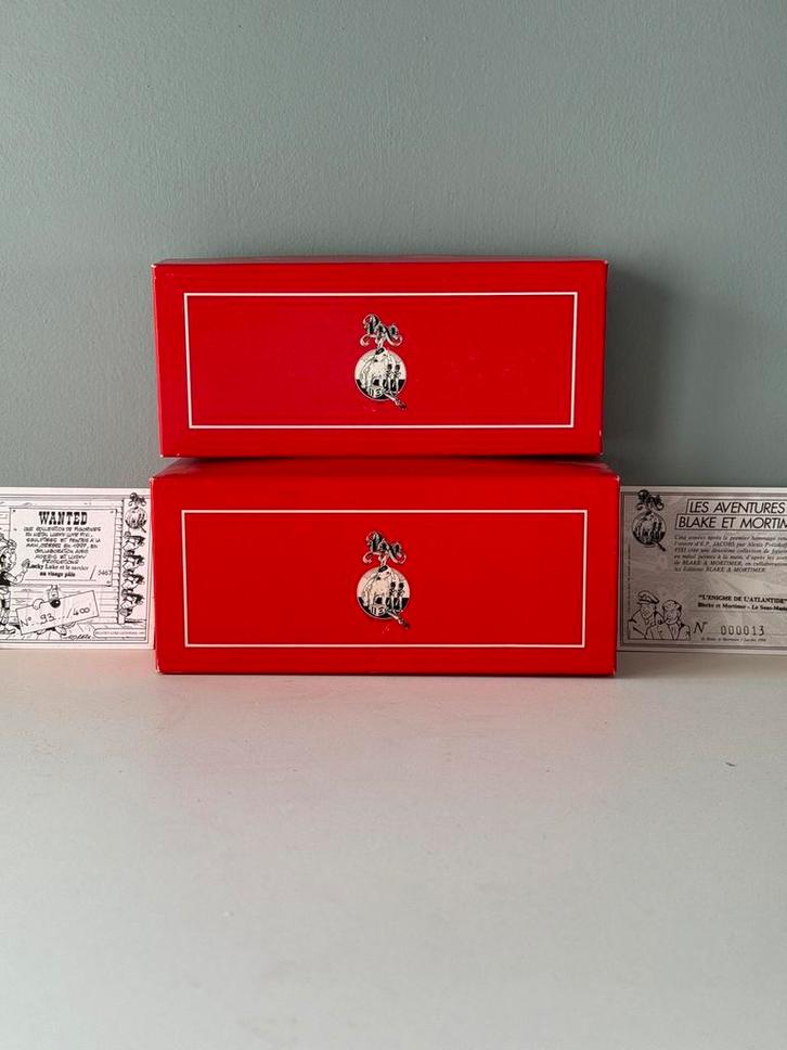2 dozen + 2 certificaten - Blake & Mortimer - Lucky Luke, Verzamelen, Beelden en Beeldjes, Zo goed als nieuw, Ophalen of Verzenden