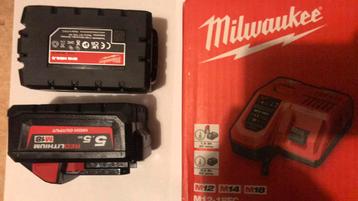 2 batteries Milwaukee m18 5,5ah high output +chargeur rapide