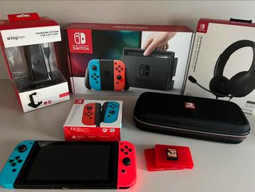 Console Nintendo Switch et accesoires + jeu beschikbaar voor biedingen