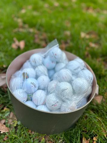 65 balles de golf blanches 