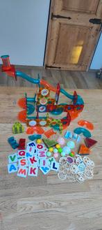 Magnetische knikkerbaan, Enlèvement