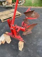 Wentelploeg minni traktor, Ophalen