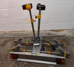 Spinder fietsendrager, Ophalen