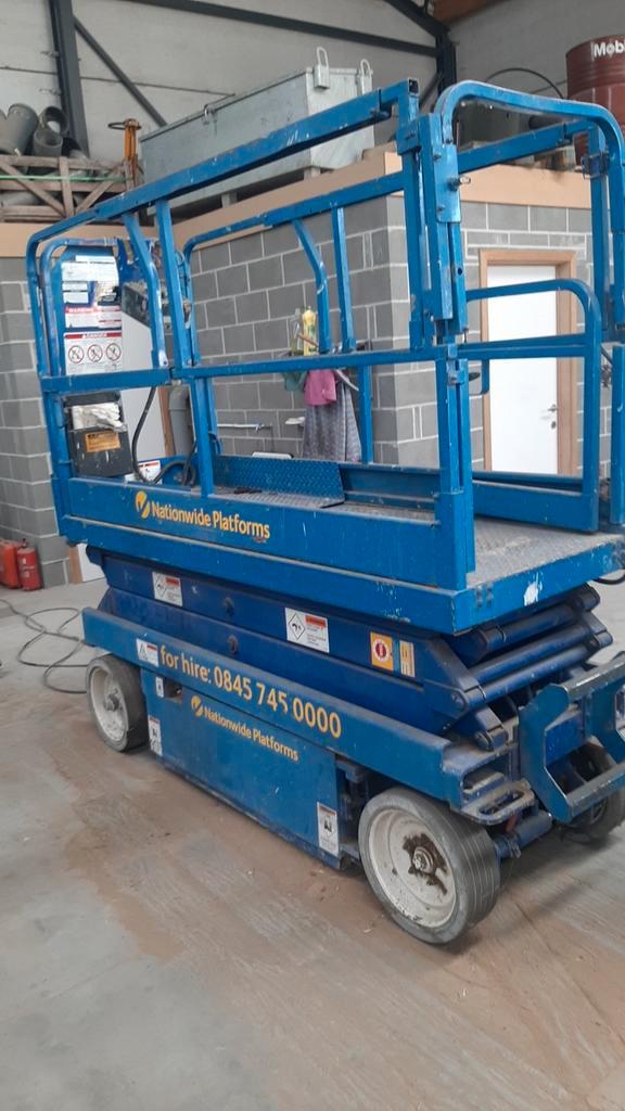 Jlg en skyjak, Zakelijke goederen, Machines en Bouw | Liften, Steigers en Ladders, Ophalen of Verzenden