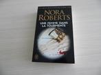 UNE FEMME DANS LA TOURMENTE       NORA ROBERTS, Livres, Comme neuf, Enlèvement ou Envoi, Nora Roberts