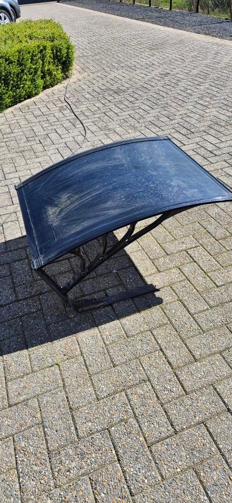 Afdekking robotmaaier of boven een deur., Ophalen