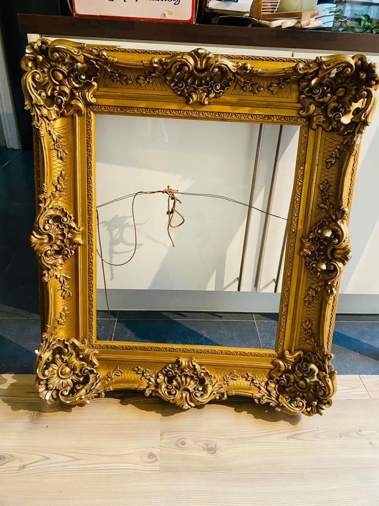 Antieke vergulden gouden kader, Ophalen