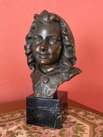 Sculptuur buste van een vrouw van Johannes DOMMISSE, Ophalen