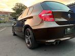 BMW 1 serie 1.6 Benzine 122pk  2010 jaar verkoop keuring, Euro 5, 1 Reeks, Zwart, Particulier