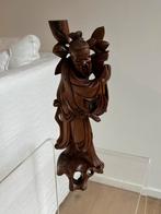 Chinees houten sculptuur, Ophalen