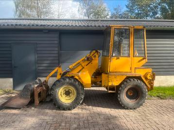 O&k L5 kniklader met grondbak en palletvorken MARGE beschikbaar voor biedingen