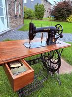 SINGER machine a coudre, Ophalen
