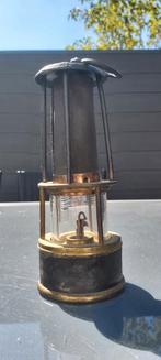 Mijnwerkerslamp, Ophalen