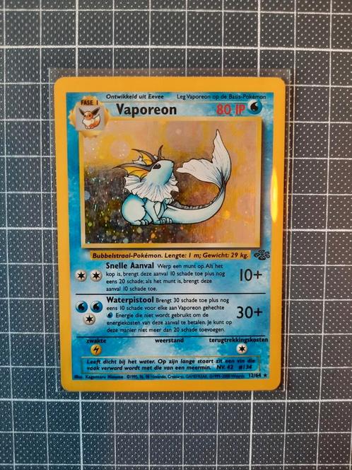 Vaporeon jungle holo, Hobby en Vrije tijd, Verzamelkaartspellen | Pokémon, Zo goed als nieuw, Ophalen of Verzenden