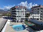 Appartement 1+1 op 100 meter van de zee 4444, Immo, Buitenland, 55 m², 2 kamers, Turkije, Stad