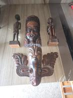 Houten beelden en maskers, Ophalen