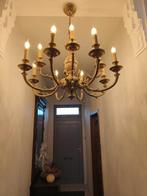 Massieve koperen luster, Ophalen