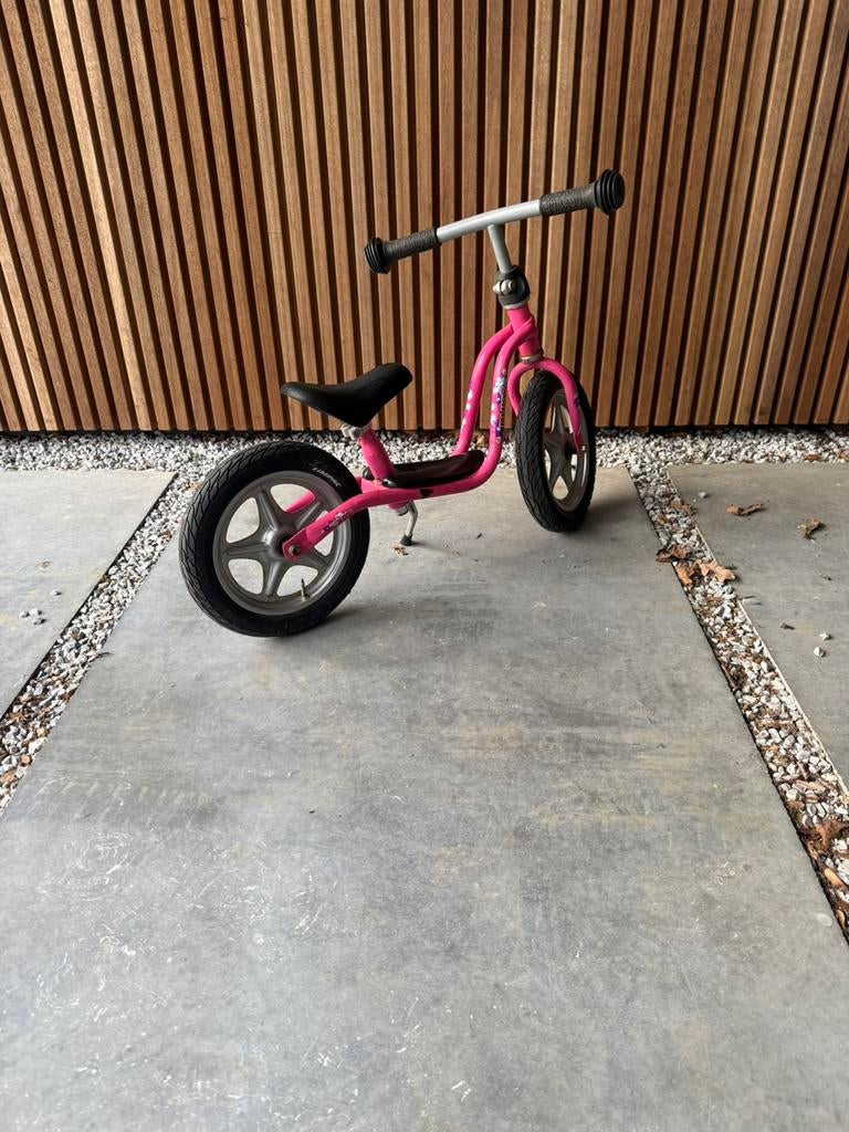 Roze loopfiets, Ophalen, Gebruikt
