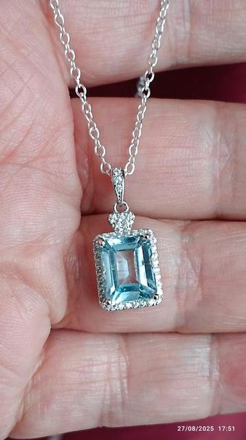 Sterling zilveren hanger met grote natuurlijke blauwe topaas beschikbaar voor biedingen