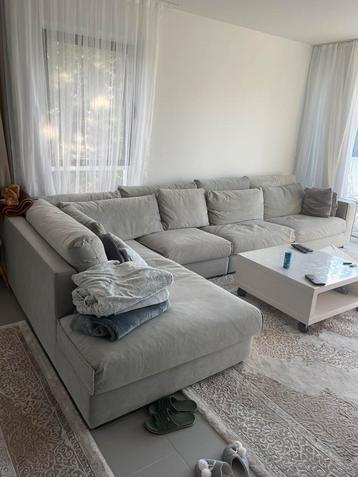 Groot grijs hoekzetel in uitstekende staat beschikbaar voor biedingen