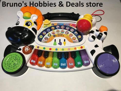 VTECH Baby Jungle Rockpiano Zebra + accessoires + bord, Kinderen en Baby's, Speelgoed | Vtech, Gebruikt, Ophalen of Verzenden